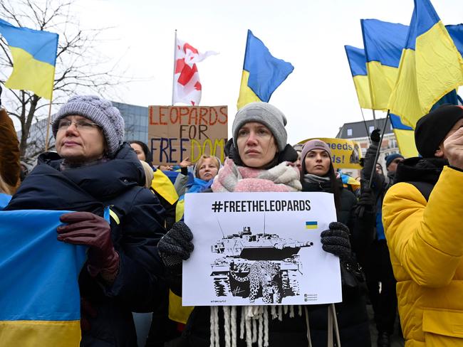 A protester holds a placard during a demonstration in support of Ukraine, during a Foreign Affairs Council meeting at the EU headquarters in Brussels on January 23, 2023. Picture: AFP