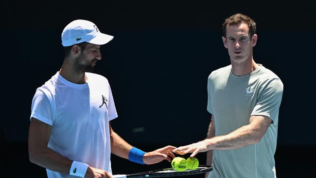 Djokovic and coach Andy Murray during a practice session ahead of the 2025 Australian Open. (Photo by WILLIAM WEST / AFP)