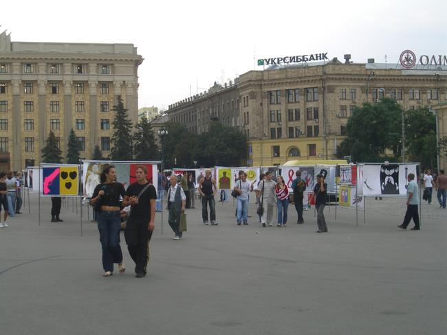 Art posters warning of the risk of HIV & AIDS as preparations are under way for the Queen + Paul Rodgers concert in Freedom Square, Kharkiv, Ukraine. Picture: Chris Griffith
