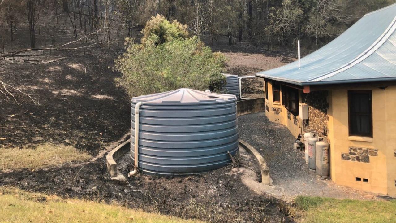 The flames licked at the side of one building on the property. Picture: Twitter/@russellcrowe