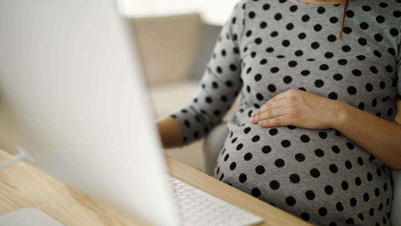 A pregnant woman has kept her pregnancy secret from her boss while working from home.