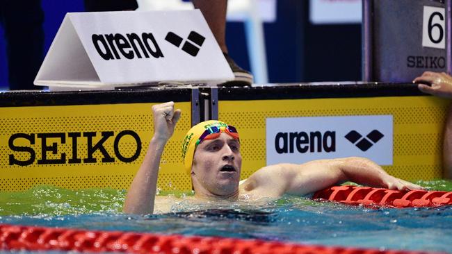 Australia's swimmer Jack McLoughlin gestures after competing in the 400m freestyle men final of the Pan Pacific Swimming Championships 2018 in Tokyo, on August 11, 2018. (Photo by Martin BUREAU / AFP)