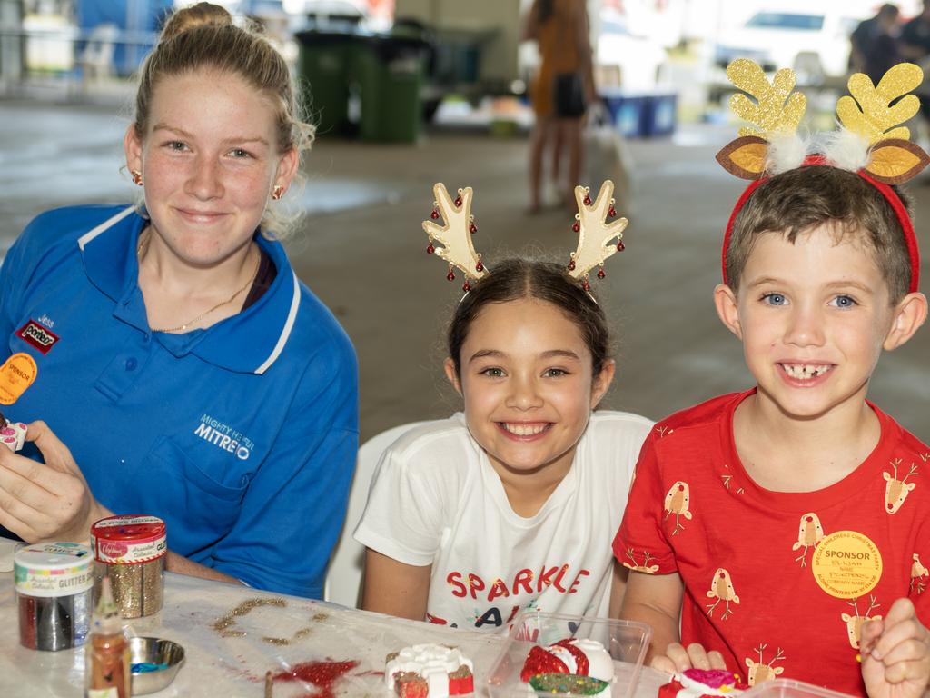 Jess Haworth from Habana with Madeline and Elijah Thompson from Bucasia at Special Childrens Christmas Party Mackay Saturday 19 Novemeber 2022. Picture: Michaela Harlow