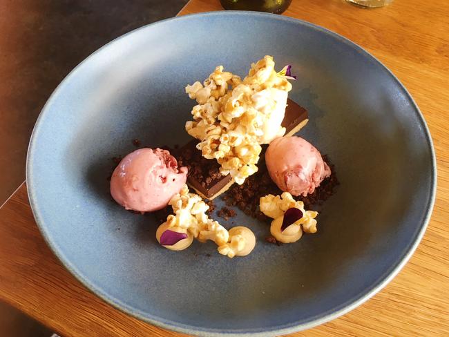 Chocolate tart with peanut cream, popcorn and cherry ice cream