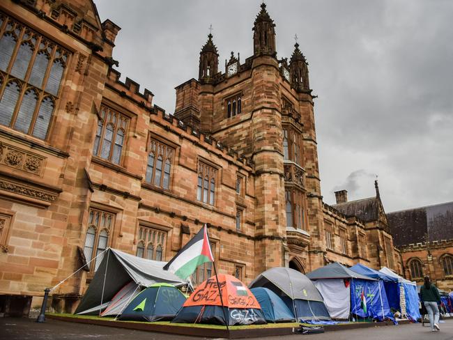 Student activists have put up tents to set up a protest camp site for Palestine at the University of Sydney in Sydney on May 3, 2024. (Photo by Ayush Kumar / AFP)