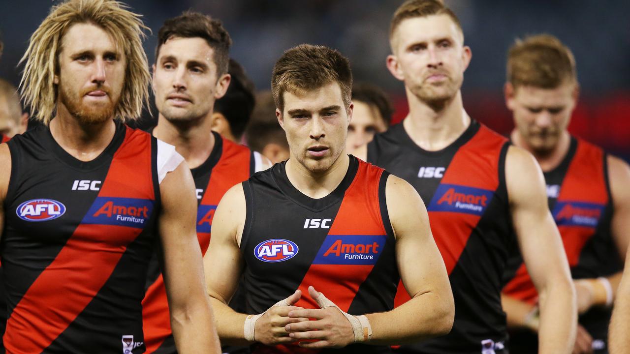 Zach Merrett (centre) believes the Bombers bought into the pre-season hype before their heavy loss to GWS. Photo: Michael Dodge/Getty Images.