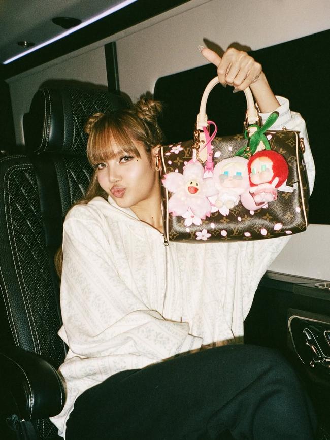 Kpop star Lisa is a big Pop Mart fan, often decorating her designer handbags with their keychain figures. Picture: Instagram