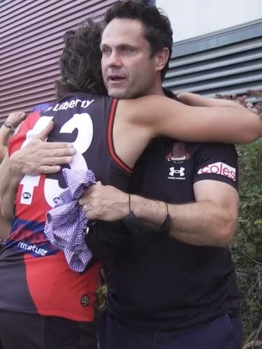 Gavin Wanganeen embraces his son Tex after he was signed by Essendon. Picture: File