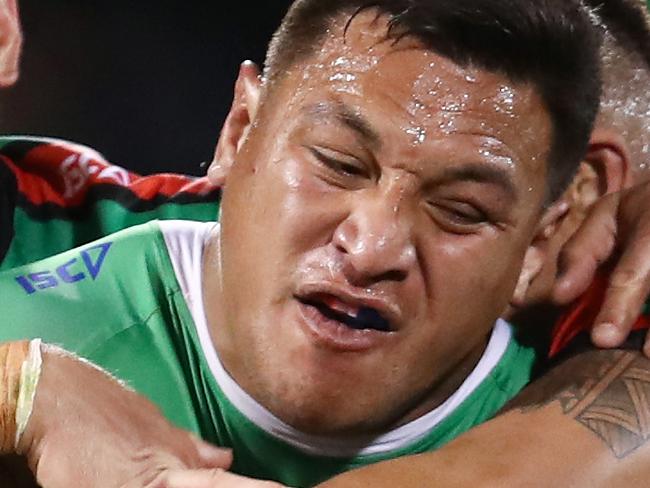 CANBERRA, AUSTRALIA - SEPTEMBER 27: Josh Papalii of the Raiders is tackled by the Rabbitohs defence during the NRL Preliminary Final match between the Canberra Raiders and the South Sydney Rabbitohs at GIO Stadium on September 27, 2019 in Canberra, Australia. (Photo by Brendon Thorne/Getty Images)