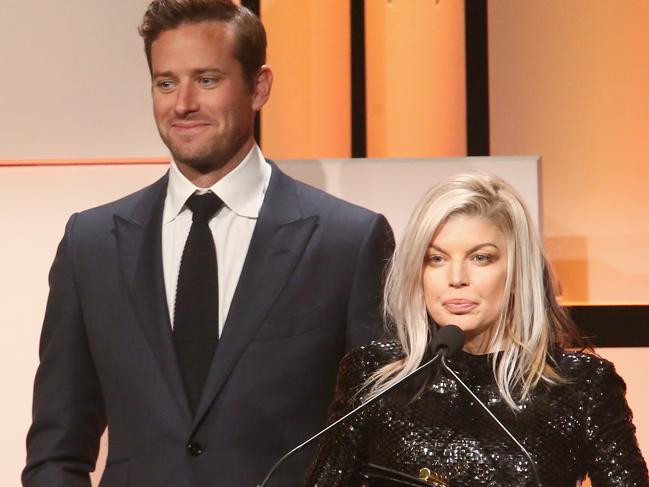 BEVERLY HILLS, CA - DECEMBER 03:  Armie Hammer (L) and Fergie speak onstage during The Trevor Project's 2017 TrevorLIVE LA Gala at The Beverly Hilton Hotel on December 3, 2017 in Beverly Hills, California.  (Photo by Tommaso Boddi/Getty Images for The Trevor Project )