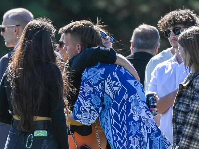 ADELAIDE, AUSTRALIA - NewsWire Photos May 11, 2023: The brother of Antonio Loiacono, Jack (in blue patterned shirt) arriving at wake at the Hope Valley Football Club oval. Antonio died after he suffered critical injuries during the season-opening A-grade game at Gumeracha Oval in the Adelaide Hills. Picture: NCA NewsWire / Naomi Jellicoe