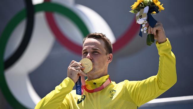 Australia's Logan Martin stands on the podium for the victory ceremony of the BMX freestyle event. Picture: AFP