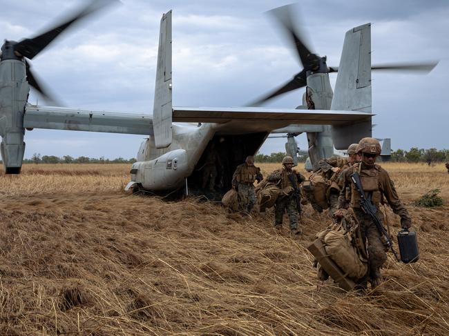 Marines from he United States Marine Corps, Marine Rotational Force - Darwin conducted training serials from RAAF Base Darwin to Bradshaw training area utilising MV-22 Osprey Aircraft. *** Local Caption *** U.S. Marines conduct advanced training in Northern Territory. The United States Marine Corps (USMC) recently conducted a rigorous training exercise at Bradshaw Field Training Area in the Northern Territory. Utilising MV-22 Osprey aircraft for transportation, the focus of the training was on Ground Threat Reaction for the Osprey crews. The Low Altitude Air Defense (LAAD) Platoon provided threat simulation, achieving valuable air defence training outcomes. Key equipment used included: **IR Training Serials:** - **UV GRIFFEN-50:** Australian Defence Force (ADF) equipment that simulates aircraft missile warning systems. - **Stinger Sim:** USMC's LAAD training equipment designed for target acquisition and lock exercises. - **Smokey Sam:** USMC equipment used to visually indicate missile launches to aircraft crews. Australian training areas and equipment allow the USMC to achieve training outcomes that are very difficult to replicate elsewhere. This exercise was also noted as a particularly valuable training exercise for the LAAD Platoon, highlighting the significant mutual training benefit of integrated Ground Threat Reaction training activities for both ground forces and aircrew.