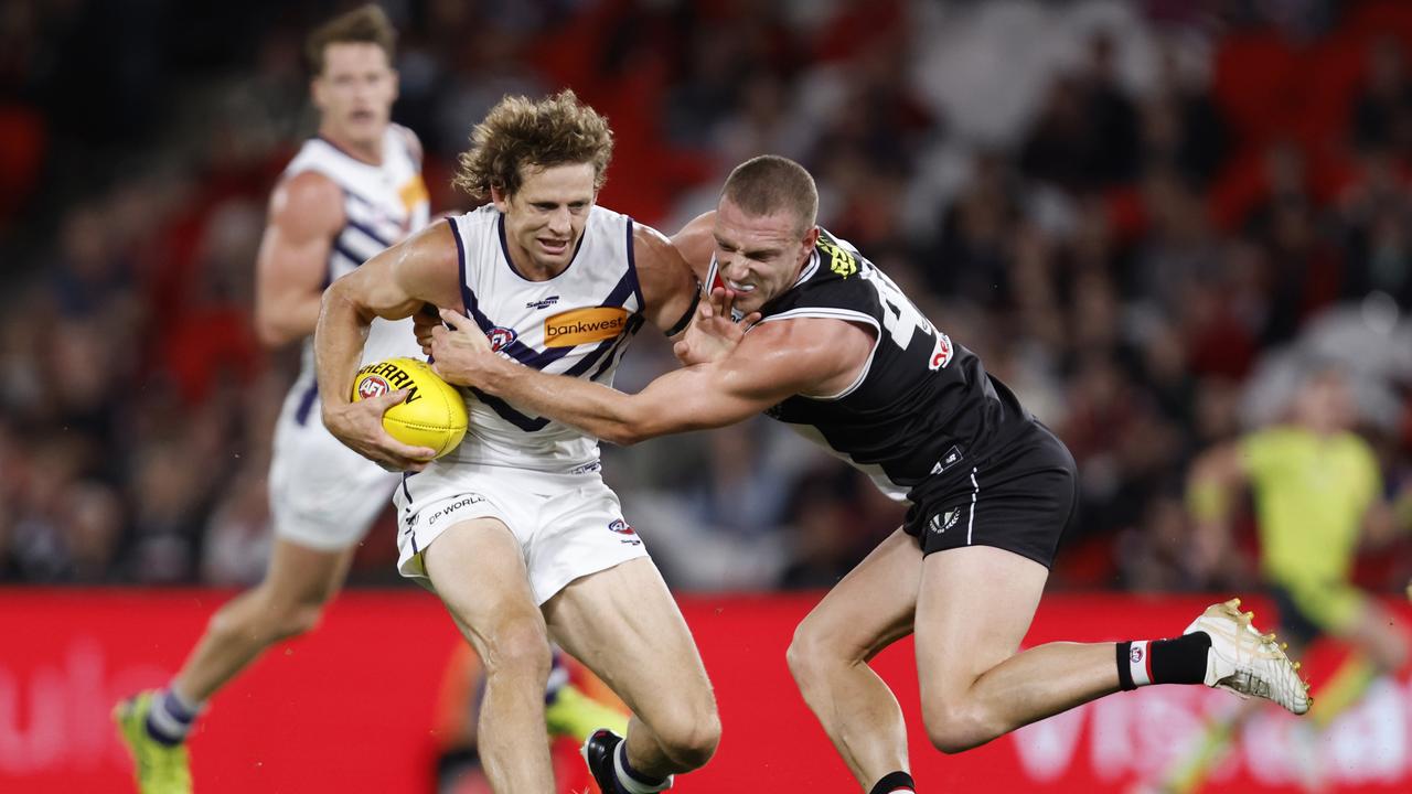 Fyfe is tackled by Callum Wilkie. Picture: Darrian Traynor/Getty Images