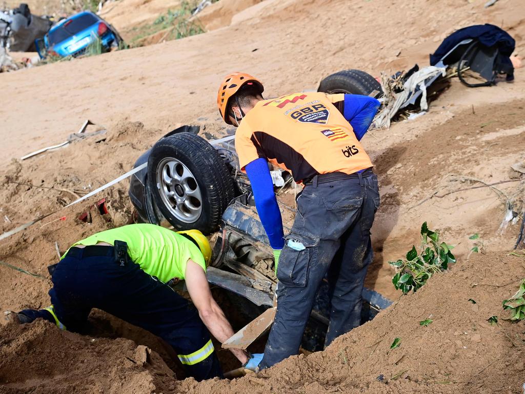 Hundreds of cars became submerged across Valencia. Picture: Jose Jordan/AFP