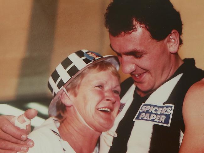 Darren Millane and his mum Denise celebrate in the Collingwood rooms after winning the 1990 premiership.