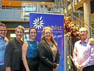 BUSINESS OPPORTUNITIES: Hans De Koning of WishList Sunshine Coast, Jennifer Swaine, Shanna Douglas of RDA, Sunshine Coast Chamber Alliance vice chairperson Linda Delamotte and Brett Frampton of Spotless, with Jared Woodbine and Jason Dobinson of All Tech industrial abseilers on the steps. Picture: Erle Levey