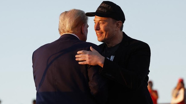 Elon Musk embraces Donald Trump during a campaign rally at the Butler Farm Show fairgrounds. Picture: Getty Images via AFP