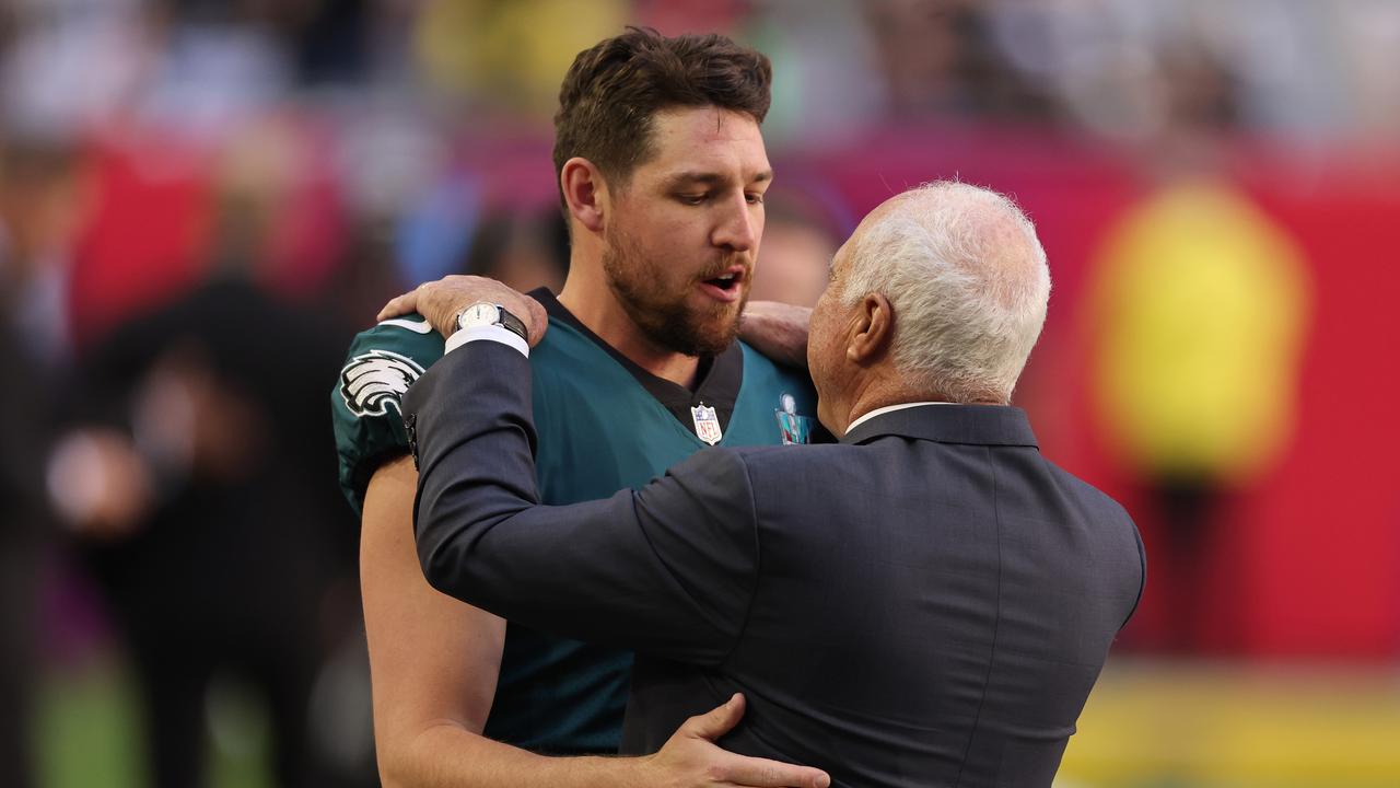 Arryn Siposs is consoled by Philadelphia Eagles owner Jeffrey Lurie after losing Super Bowl LVII to the Kansas City Chiefs at State Farm Stadium in February. Picture: Gregory Shamus / Getty Images