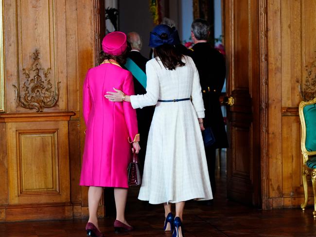 Queen Mary of Denmark and Queen Silvia of Sweden leave during a welcome ceremony at the Royal Palace in Stockholm, Sweden. Picture: AFP