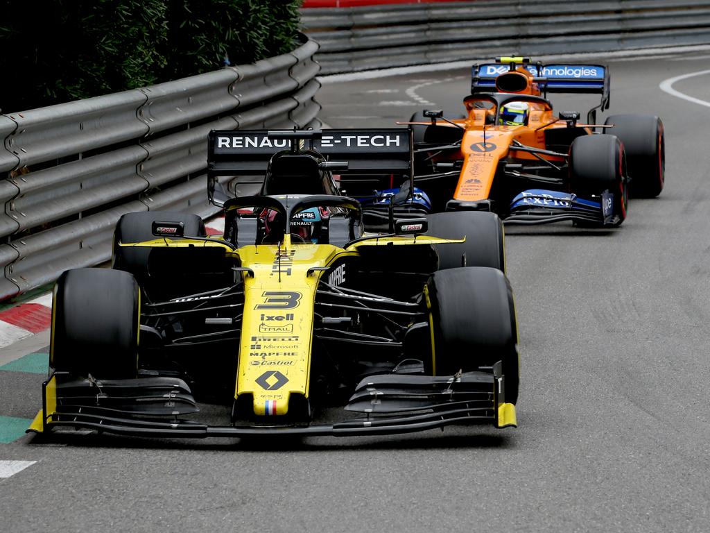 Ricciardo in front of future teammate Lando Norris in the McLaren.