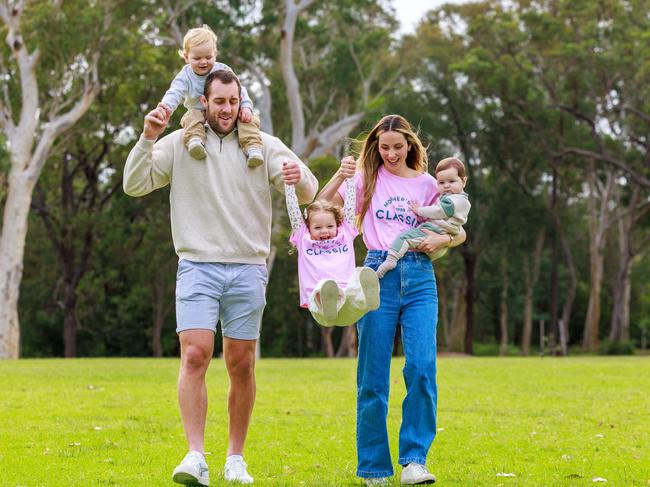 Isaah Yeo and Ashleigh Camenzuli, with their children, Lennox, 2, Haven, 3, and Tatum, 8 months, in Glenbrook. Picture: Justin Lloyd
