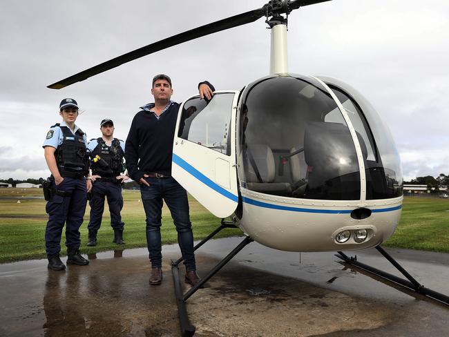 16/03/2020. Cropdusting pilot Charlie Tootell, with (L-R) Constables Kat Smith and Patrick Bourke acts as a defacto PolAir chopper for police in regional NSW. Charlie steps in in to help with long distance police pursuits and other criminal activity. Jane Dempster/The Australian.