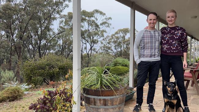 Bec Covington and partner Shaun Byrne at their off-grid home near Castlemaine, Victoria. Picture: Supplied