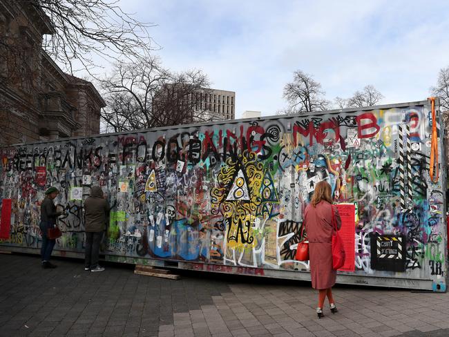 The Aftermath Dislocation Principle can be seen through tiny peep holes in a forty-foot shipping container on the forecourt of Hobart Town Hall. Picture: NIKKI DAVIS-JONES