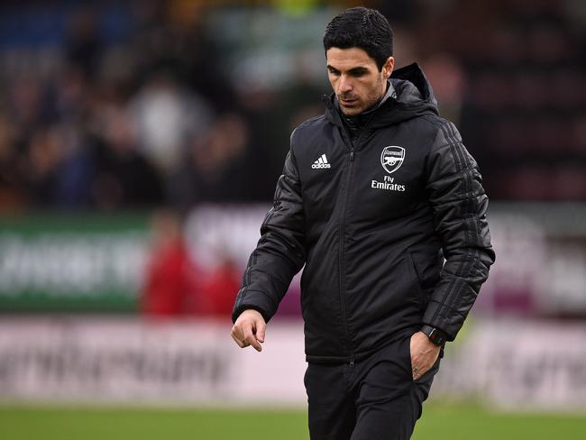 (FILES) In this file photo taken on February 02, 2020 Arsenal's Spanish head coach Mikel Arteta gestures as he leaves after the English Premier League football match between Burnley and Arsenal at Turf Moor in Burnley, north west England. - Arsenal manager Mikel Arteta has tested positive for the coronavirus, the Premier League club announced on March 12, 2020. 
