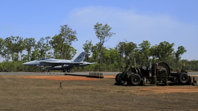 An F/A-18F Super Hornet from No. 1 Squadron lands, using the Mobile Aircraft Arrestor System at RAAF Base Scherger, during Exercise Talisman Sabre 2021.