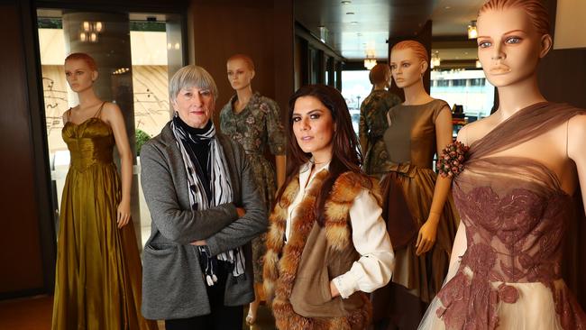 Ladies in Black producers, Sue Milliken, left, and Allanah Zitserman with some of the dresses from the film. Picture: John Feder