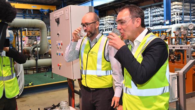 Plant Manager Javier Artal and Premier Steven Marshall test desalinated water at the plant. Picture: AAP / Keryn Stevens