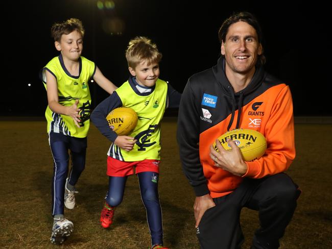 Ryan Griffen from GWS Giants visited Camden Blues junior AFL team to run drills with kids including Isaac and Jacob Hort. Sports of all sorts are blooming in the area.