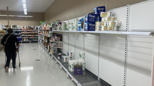 Glenelg Coles toilet paper and hand sanitiser shelves looking sparse. Again.