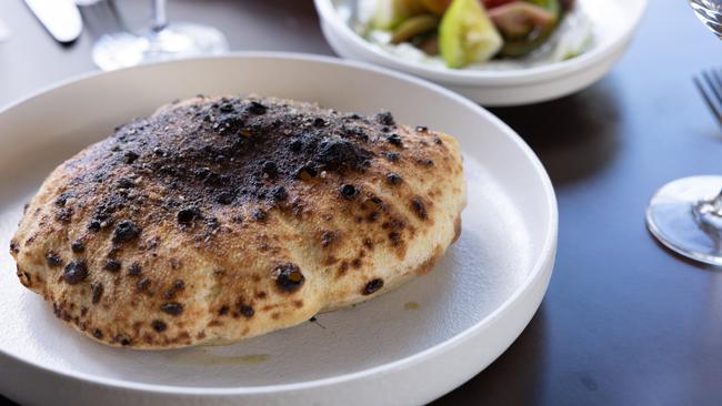 The wood-fired pita at Emme. Picture: David Kelly