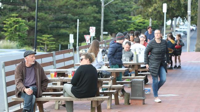 Crowds of people in Cowes on Phillip Island, while the rest of Melbourne is locked down. Picture: Alex Coppel.