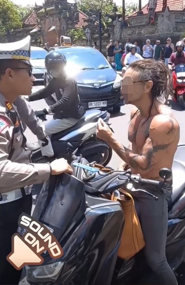 He was filmed having a heated exchange with several police officers. Picture: Instagram/moscow_cabang_bali