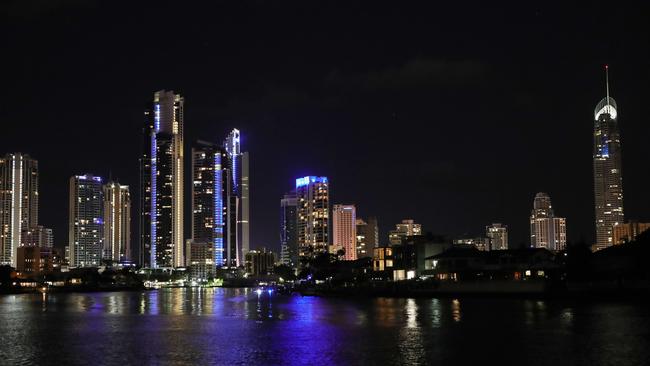 The Surfers Paradise skyline has many fewer lights on thanks to a lack of tourists. Picture Glenn Hampson