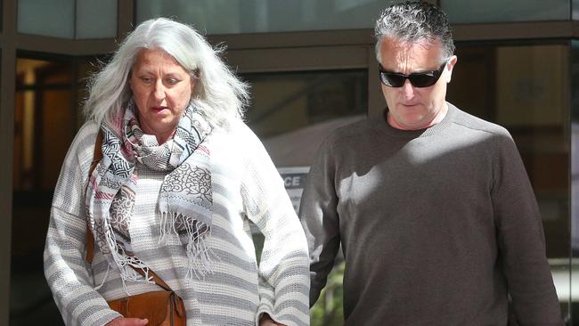 Montague St bus driver Jack Aston leaves the Melbourne Magistrates Court with his wife Wendy. Picture: Hamish Blair