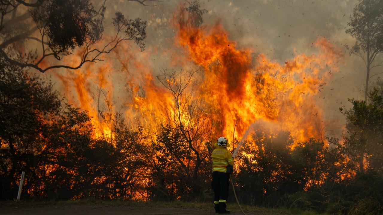 Firefighters battle a blaze north of Newcastle. Picture: NSW RFS