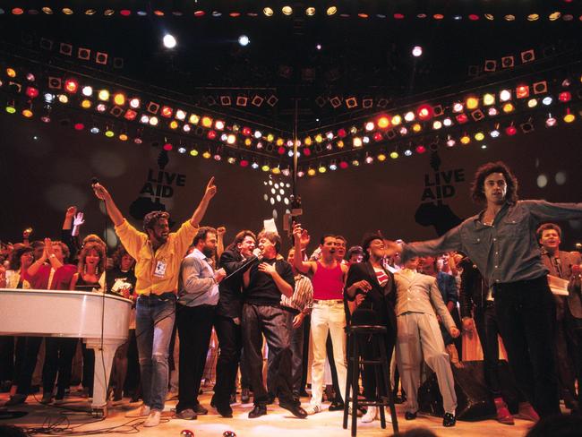 George Michael, Bono, Paul McCartney, Freddie Mercury and Bob Geldof perform on stage during the Live Aid concert at Wembley Stadium on July 13, 1985. Picture: Georges De Keerle/Getty Images