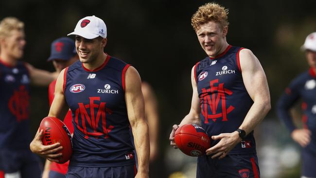 Demon Clayton Oliver, right, is one of three top-line premiums Mr. SuperCoach has locked in.