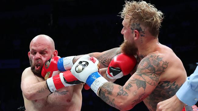 HATO REY, PUERTO RICO - MARCH 02: Jake Paul punches Ryan Bourland during their cruiserweight fight at Coliseo de Puerto Rico on March 02, 2024 in Hato Rey, Puerto Rico.   Al Bello/Getty Images/AFP (Photo by AL BELLO / GETTY IMAGES NORTH AMERICA / Getty Images via AFP)