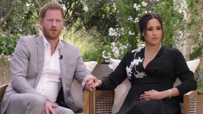 Prince Harry and Meghan at home during their interview with Oprah. Picture: CBS