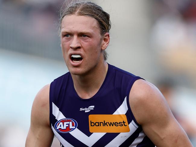 GEELONG, AUSTRALIA - JULY 29: Hayden Young of the Dockers in action during the 2023 AFL Round 20 match between the Geelong Cats and the Fremantle Dockers at GMHBA Stadium on July 29, 2023 in Geelong, Australia. (Photo by Michael Willson/AFL Photos via Getty Images)