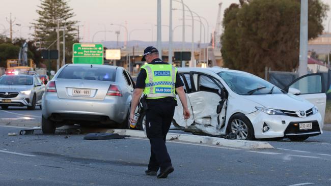 Police and emergency services at the scene of the crash. Picture: Dean Martin