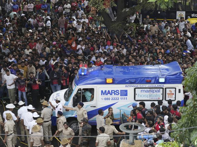 An ambulance arrives at the M. Chinnaswamy Stadium. Picture: AP Photo/Aijaz Rahi