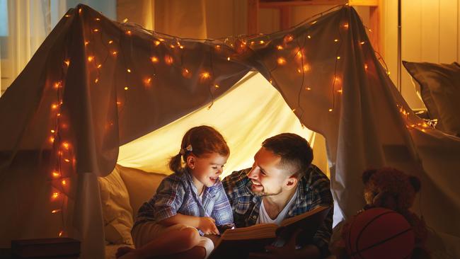 Reading can be a great opportunity to reconnect with your kids. Picture: iStock