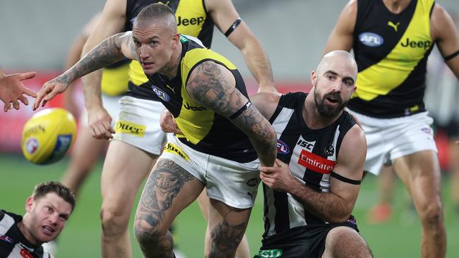 Steele Sidebottom tackles Richmond star Dustin Martin. Picture: Michael Klein